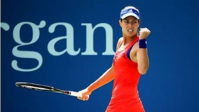 Ana Ivanovic celebrates a point during her win over Anna Tatishvili in the first round of the US Open on Tuesday. Al Bello / Getty Images