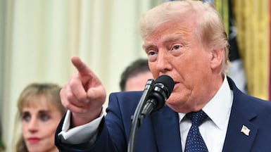 President Donald Trump answered questions about his controversial call to Fifa. AFP