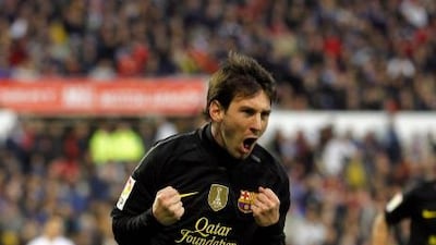 Lionel Messi celebrates a goal against Real Zaragoza.