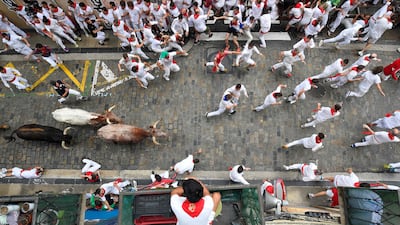 Thrill-seekers take part in the first bull-run of the San Fermin festival in Pamplona, northern Spain. AFP