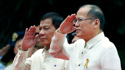 Filipino President Rodrigo Duterte, left, and predecessor Benigno Aquino at Duterte's inauguration ceremony at the Malacanang Presidential Palace grounds in Manila on July 30, 2016. EPA