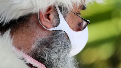 He wears face masks and practises two metres of social distancing when meeting children.