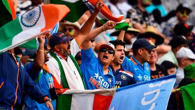 Indian fans cheer during the second day of the second cricket Test match between Australia and India at the MCG in Melbourne. AFP