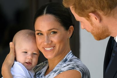 FILE PHOTO: Britain's Prince Harry and his wife Meghan, Duchess of Sussex holding their son Archie, meet Archbishop Desmond Tutu (not pictured) at the Desmond & Leah Tutu Legacy Foundation in Cape Town, South Africa, September 25, 2019. REUTERS/Toby Melville/File Photo