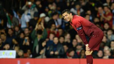Portugal's Cristiano Ronaldo reacts during his team's 1-0 international friendly win over Argentina at Manchester United's Old Trafford on Tuesday night. Nigel Roddis / EPA / November 18, 2014