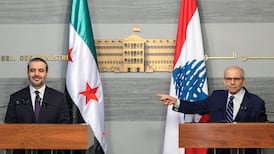 Syria's Foreign Minister Asaad Al Shibani and Lebanon's Prime Minister Nawaf Salam address a news conference in Beirut. Reuters