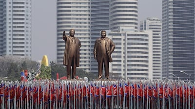 University students carrying the national flag and two bronze statues of the late leaders Kim Il-sung and Kim Jong-il during the parade where the North displayed its military might amid tensions in the Korean Peninsula. Wong Maye-E/AP Photo