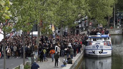 French Left party leader and candidate for the 2017 French presidential election, Jean-Luc Melenchon, gives a speech from a barge on the canal de l'Ourcq in Paris. Thibault Camus / AP