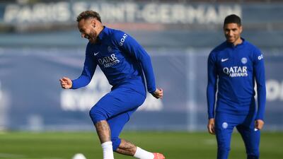 Neymar jokes around during a training session. AFP