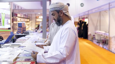Omanis visit the book fair.