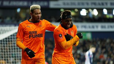 Joelinton celebrates with Allan Saint-Maximin during the FA Cup win at West Bromwich Albion. Reuters