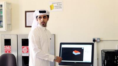 Mechanical engineer Fahad al-Musalam, 24, shows on a screen a design of a 3D printed World Cup stadium at a laboratory at Qatar University in Doha, Qatar June 16, 2016. REUTERS/Ibraheem Al Omari