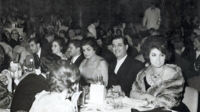 Yusuf Beidas sitting next to Muna Al Solh, mother of Saudi Prince Al Waleed bin Talal, in Beirut in the early 1960s.
