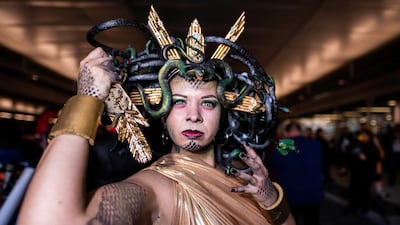 An attendee dressed as Medusa poses during New York Comic Con at the Jacob K. Javits Convention Center in New York. AP
