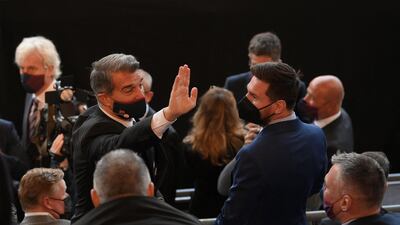 Joan Laporta greets star forward Lionel Messi at the Barcelona president's official inauguration at Camp Nou on Wednesday, March 17. AFP