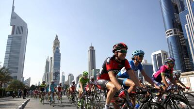 Cyclists start the third stage of the Dubai Tour on Friday. Kamran Jebreili / AFP