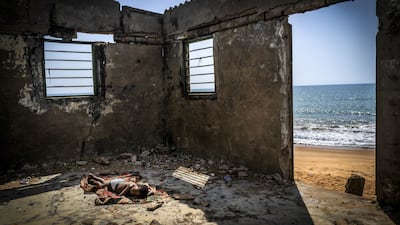 The winner of the Environmental Photographer of the Year Award is 'The Rising Tide Son', by Antonio Aragon Renuncio, which shows a child sleeping on the floor of his house that is about to collapse, destroyed by coastal erosion on Afidegnigba beach in Ghana. Photo: Antonio Aragon Renuncio / Environmental Photographer of the Year 2021