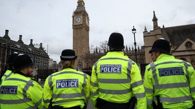 Police outside the Houses of Parliament on Wednesday. Three female MPs now have bodyguards after they received serious threats. EPA