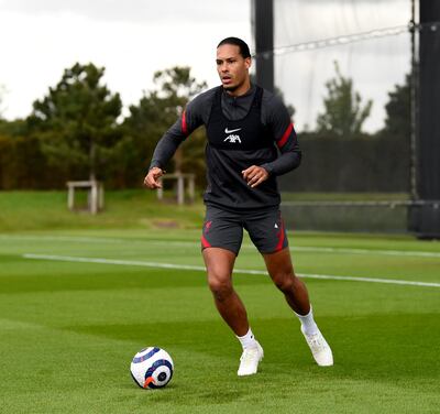 Virgil van Dijk continuing his rehabilitation from a serious knee injury with Liverpool on Wednesday. Getty