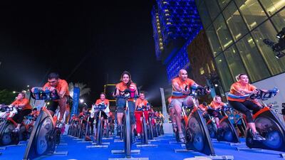 Cleveland Clinic Abu Dhabi's community health initiative, Cycle for Health UAE, launched on October 26 with a series of stationary cycling classes. Courtesy Cleveland Clinic Abu Dhabi
