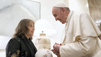 Pope Francis speaks with athlete Chaica Al Qassimi after a reception at Al Mushrif Palace on February 4, 2019. Ryan Carter / Ministry of Presidential Affairs