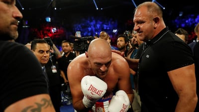 Tyson Fury celebrates winning the fight. REUTERS