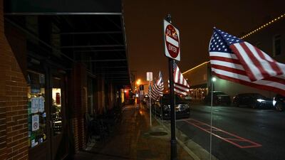 American Flags line the streets of Marietta a day before the US midterm election in Georgia. Reuters