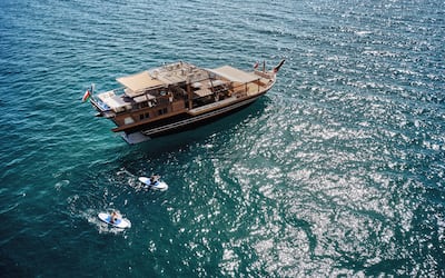 Guests can book to stay for one or two nights on a large dhow boat as part of their experience. Photo: Six Senses Zighy Bay