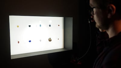 A man looks at the items that were stolen from the British Museum