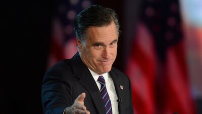 Mitt Romney arrives on stage to concede the election to President Barack Obama. Don Emmert / AFP