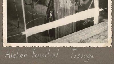 Vers la Tunisie...Sur le Kairouan (A Trip to Tunisia on the Kairouan). A woman weaves on a loom in Matmata, Tunisia, circa 1951