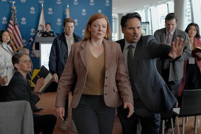 Sarah Snook, center, and Michael Pena, star in the new OSN+ series All Her Fault. Photo: Peacock