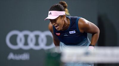 Naomi Osaka celebrates winning a point. AP Photo