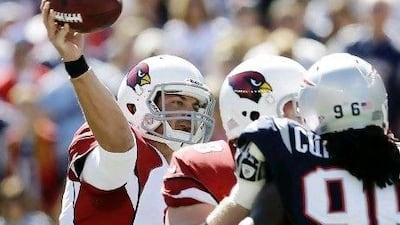 Finding success in the first two games of the season, Arizona's Kevin Kolb, left, has been in the NFL long enough to not get too up when things are going well or too down when it all goes wrong.