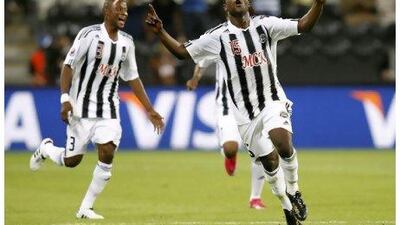 TP Mazembe’s Kiritcho Kasusula, right, celebrates after his side’s 2-0 victory over Internacional on Wednesday that booked their place in tomorrow’s final.