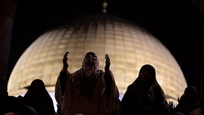 Women pray in front of the Dome of the Rock during Laylat Al Qadr in Jerusalem's Old City on June 11, 2018. Ammar Awad / Reuters