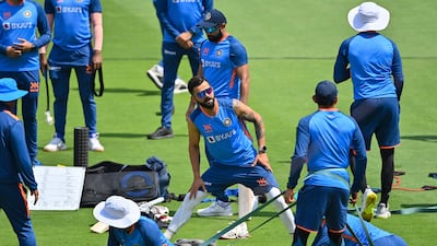 India’s Virat Kohli, centre, warms up during training ahead of the fourth Test against Australia at Narendra Modi Stadium in Ahmedabad, on March 7, 2023. AFP