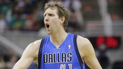 Dirk Nowitzki needs 232 points to pass Hakeem Olajuwon for ninth in all-time NBA scoring after passing Oscar Robertson for 10th on Tuesday night. Rick Bowmer / AP / April 8, 2014