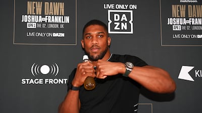 Anthony Joshua poses for a photo at the launch party for his upcoming bout against Jermaine Franklin at Battersea Power station on March 27, 2023 in London, England. Getty Images