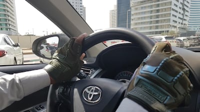 The driving gloves are becoming popular with Abu Dhabi drivers. Picture by Saeed Saeed