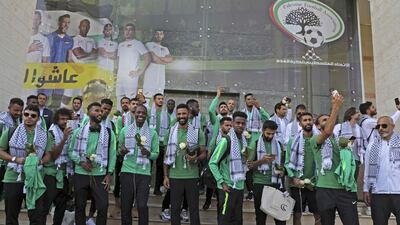 Members of Saudi Arabia's national football team are welcomed in the Palestinian city of Ramallah upon the team's arrival in the occupied Palestinian territories where they will play for the first time. AFP