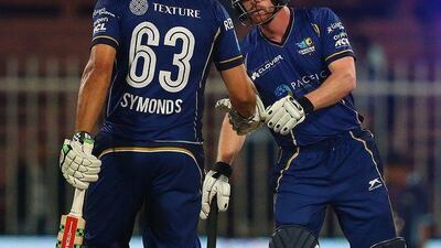 Paul Collingwood of Capricorn Commanders is congratulated by Andrew Symonds after hitting a six during their Masters Champions League T20 win on Friday night. Francois Nel / Getty Images