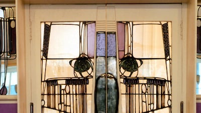 Ornate doors at the Willow Tea room on Sauchiehall Street in Glasgow, designed by Charles Rennie Mackintosh. Courtesy Visit Scotland