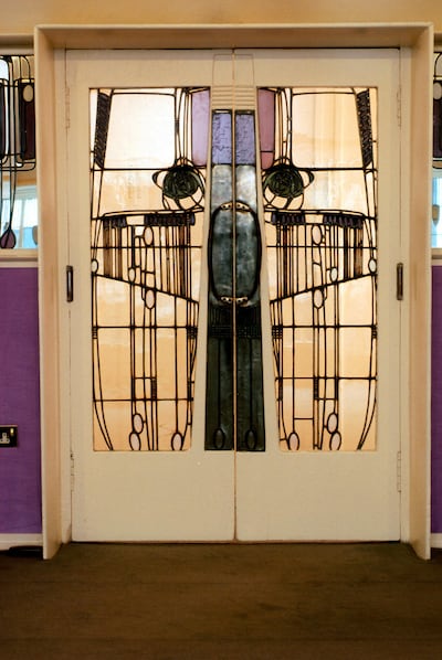 Ornate doors at the Willow Tea room on Sauchiehall Street in Glasgow, designed by Charles Rennie Mackintosh. Courtesy Visit Scotland