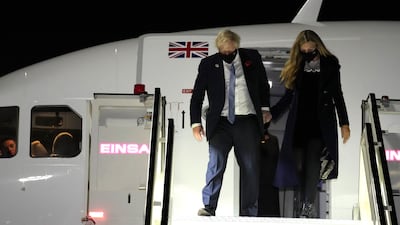 Britain's Prime Minister Boris Johnson and his wife Carrie arrive in Rome. AP