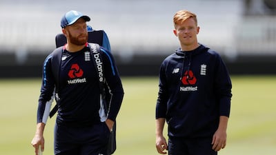 Ollie Pope, right, could find himself in line for a place in England's starting XI for the first Test against Sri Lanka if teammate Jonny Bairstow, right, is ruled out with an ankle injury. Reuters