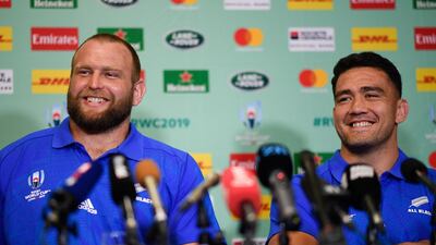 New Zealand prop Joe Moody, left, shares a laugh with hooker Codie Taylor as they deliver a press conference in Beppu, Japan. AFP