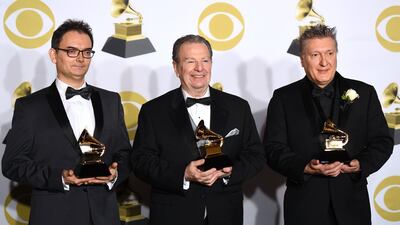 Claudio Ragazzi, Hector Del Curto and Pablo Ziegler, winners of Best Latin Jazz Album, pose in the press room. AFP