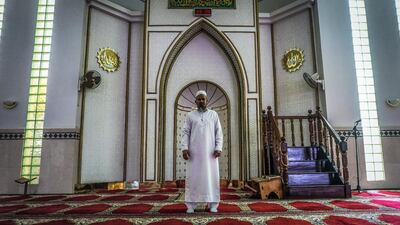 Macsud Samsudin, 47-year-old deputy of the Jumma Mosque, stands in its main prayer hall in Maputo, Mozambique, March 23, 2019. Jack Moore / The National