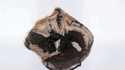 Wood statue at West Elm, Dh399